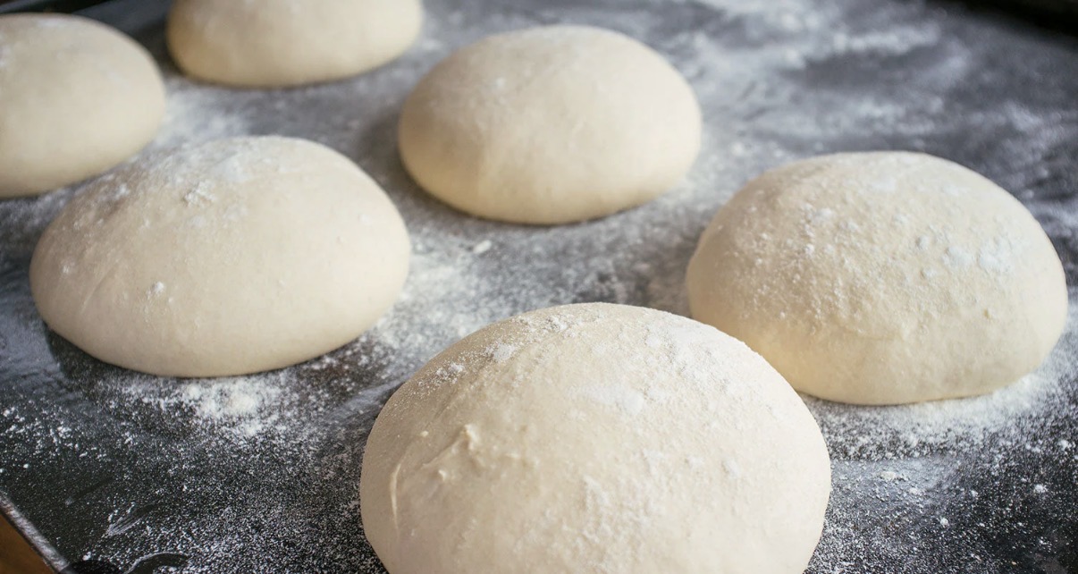 Closeup of individually portioned Forno Medici pizza dough balls